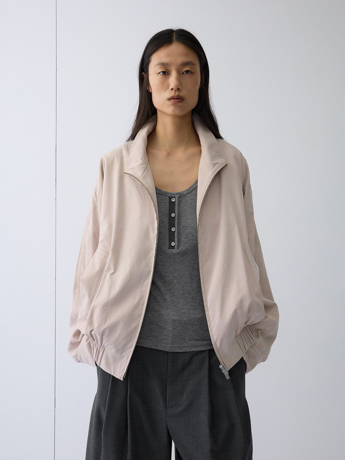 Random Piece Nylon Blend Zip Up Cropped Jacket in Beige - On Female Model