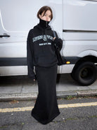 RARELY ALIKE Double Waistband Mermaid Maxi Skirt in Black - On Female Model