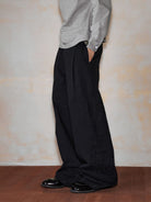 MEDM Embroidered Cotton Cargo Pants in Black - On Model