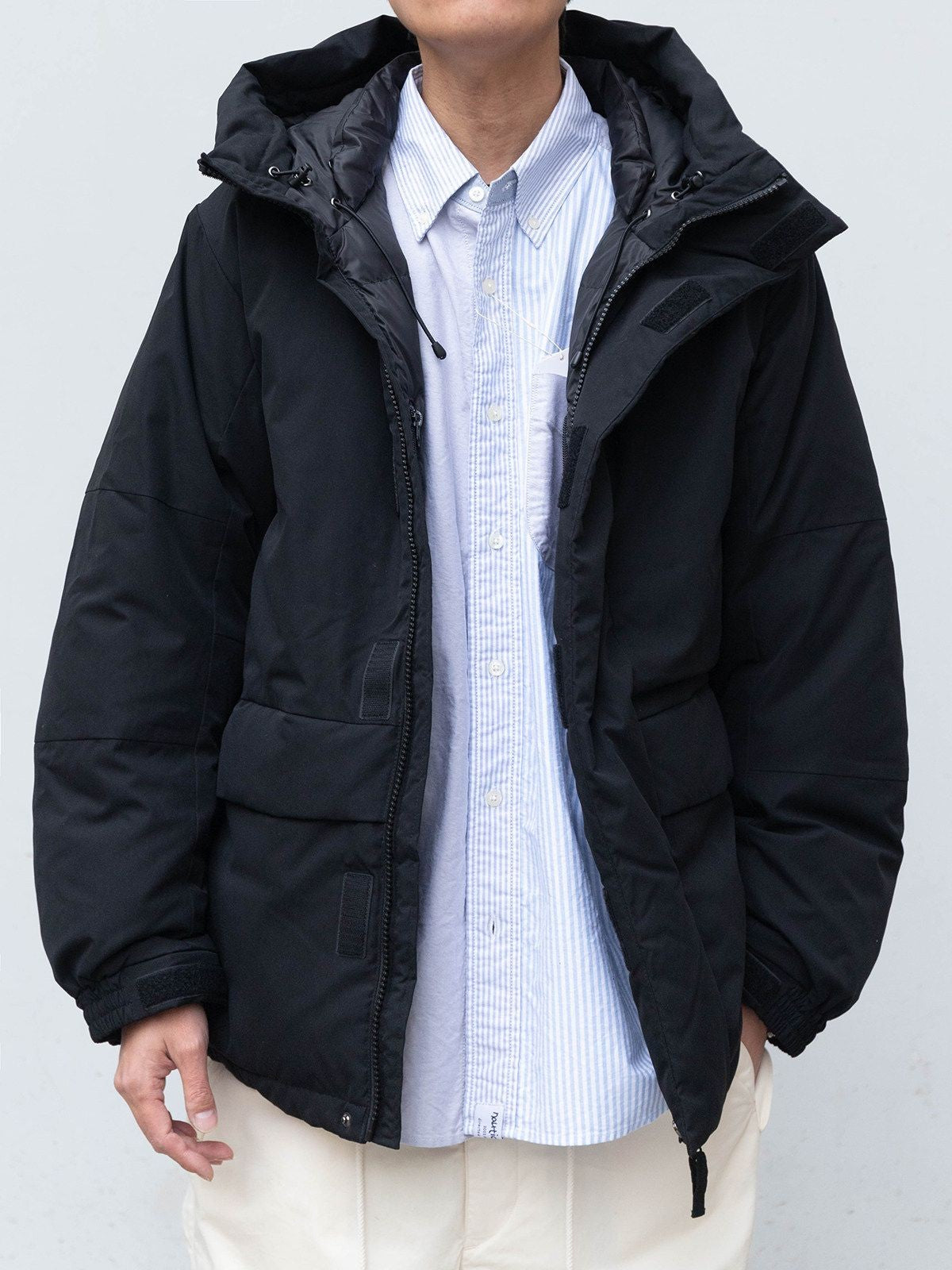 Soda Mid Length Hooded Down Puffer in Black - On Male Model
