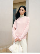 TEASEL Washable Merino Wool Sweatshirt in Pink - On Female Model