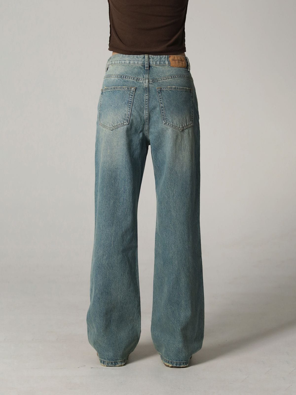 MASONPRINCE High Waisted Distressed Flared Jeans in Denim - On Model