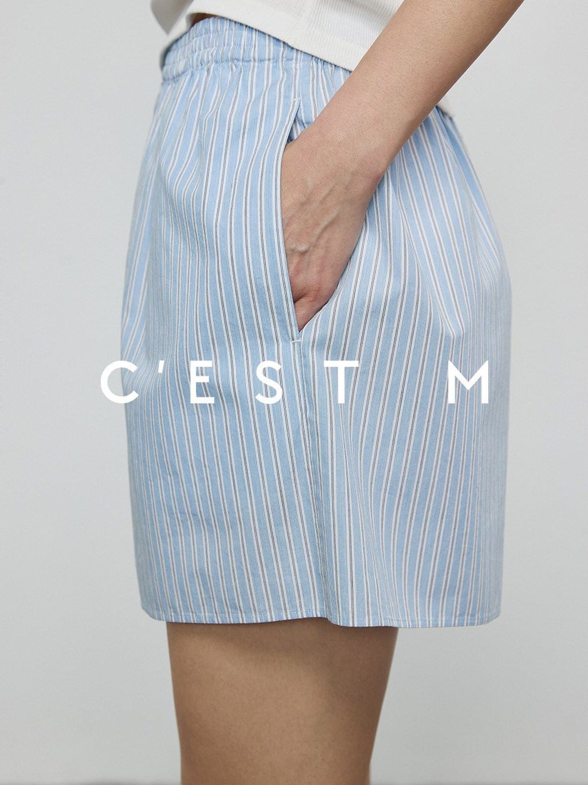 CEST M Striped Organic Pima Cotton Shorts in Sky Blue - On Female Model