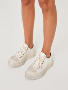 SMFK Distressed Canvas Skate Sneakers in White - On Female Model