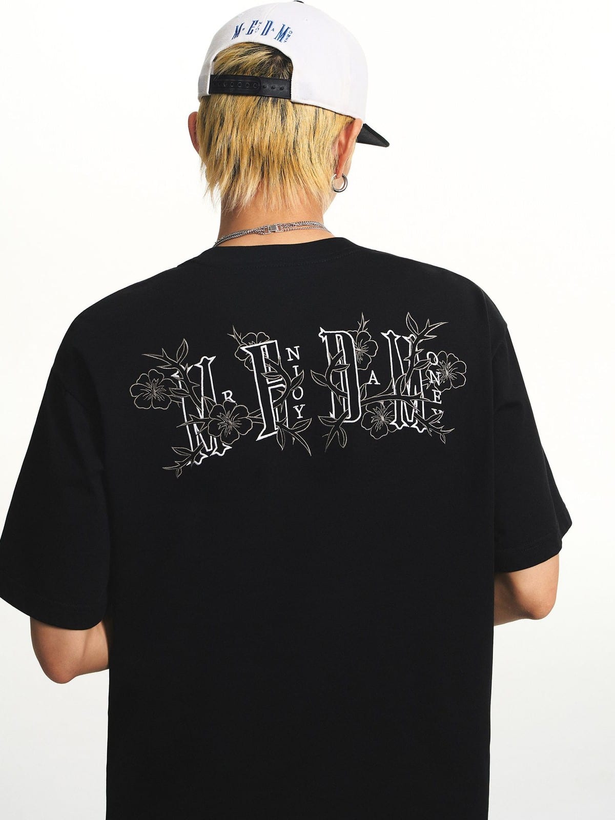 MEDM Floral Graphic Cotton Sorona T Shirt in Black - On Model