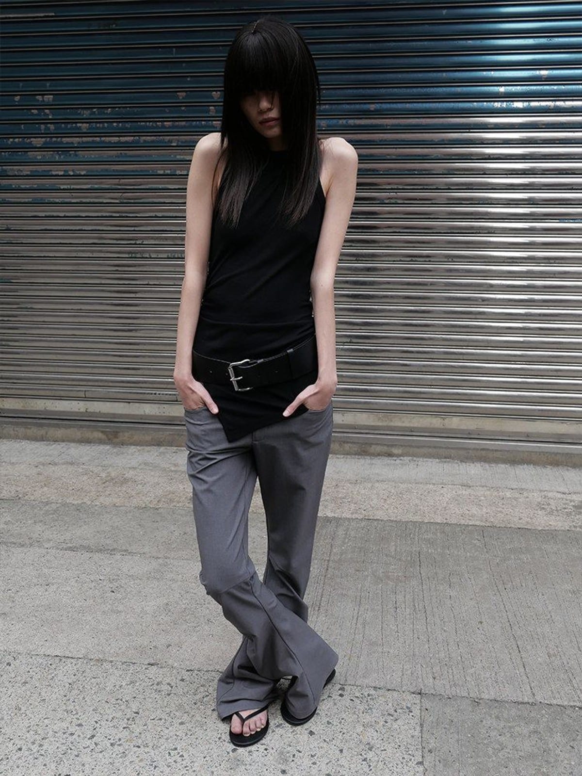 RARELY ALIKE Curved Leg Flared Dress Pants in Gray - On Female Model