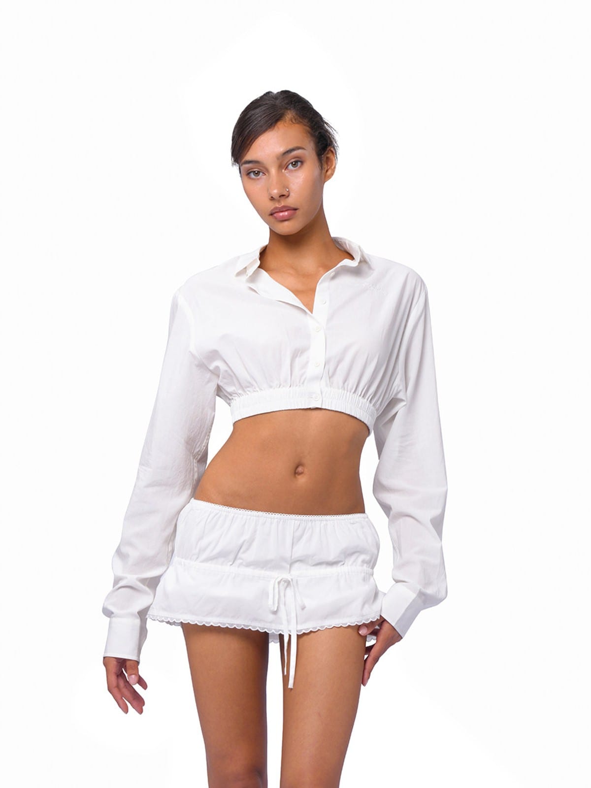 SweetChilling Drawstring Ruffled Mini Skirt in White - On Female Model