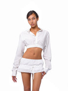 SweetChilling Drawstring Ruffled Mini Skirt in White - On Female Model