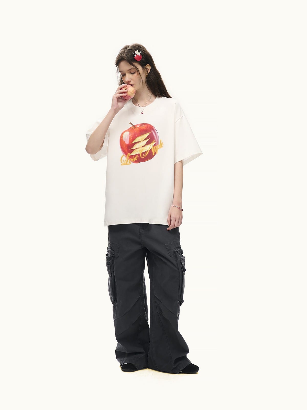 LOSTCTRL Apple Graphic Print T Shirt in White - On Female Model