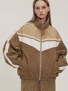 LOSTCTRL Vintage Monogram Track Jacket in Beige - On Female Model