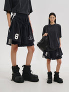 MASONPRINCE Convertible Layered Cotton Skirt Shorts in Black - On Female Model