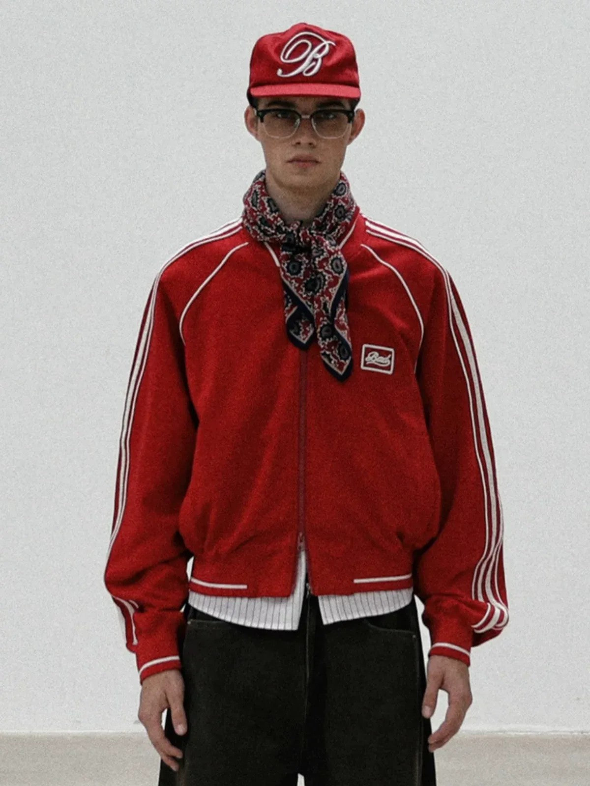 BADSEED Side Stripe Cotton Bomber Jacket in Red - On Male Model