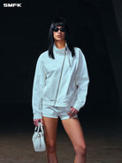SMFK Asymmetric Zip Cotton Track Jacket in White - On Female Model