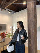 MSBEAST Cropped Sheepskin Leather Shirt Jacket in Black - On Female Model