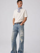 SIMPLE PROJECT Distressed Patchwork Flared Jeans in Blue - On Male Model