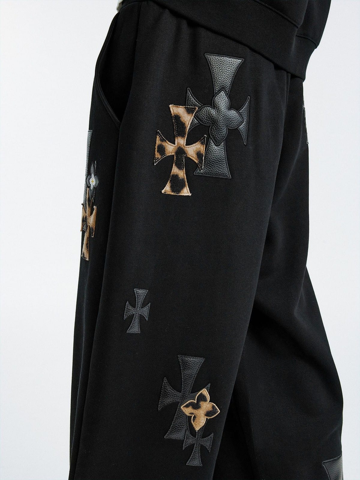 MEDM Leopard Leather Patch Drawstring Pants in Black - On Model