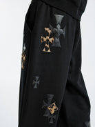 MEDM Leopard Leather Patch Drawstring Pants in Black - On Model
