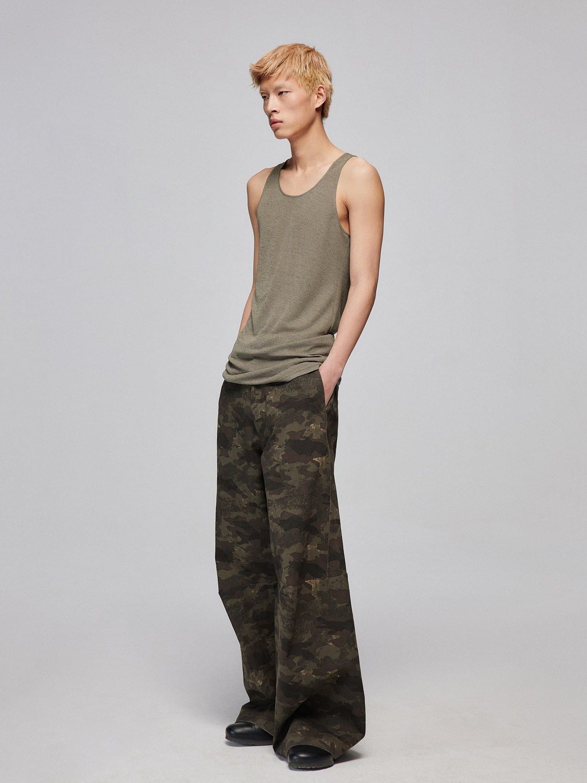 SIMPLE PROJECT Longline Stretch Knit Tank Top in Beige - On Male Model