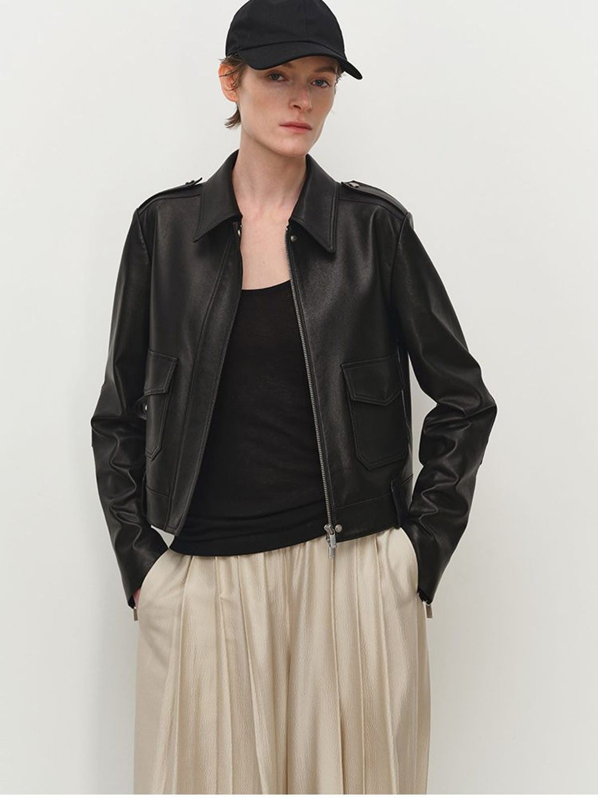 MSBEAST Cropped Sheepskin Moto Jacket in Black - On Female Model