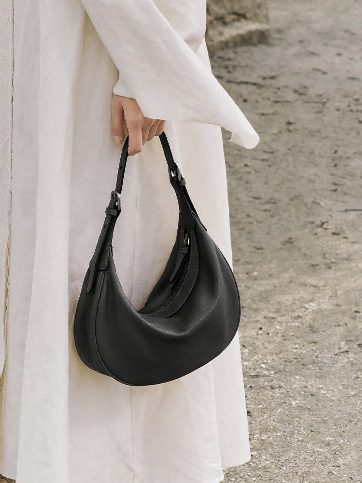 QIUZHEN Vegetable Tanned Leather Crescent Bag in Black - On Model