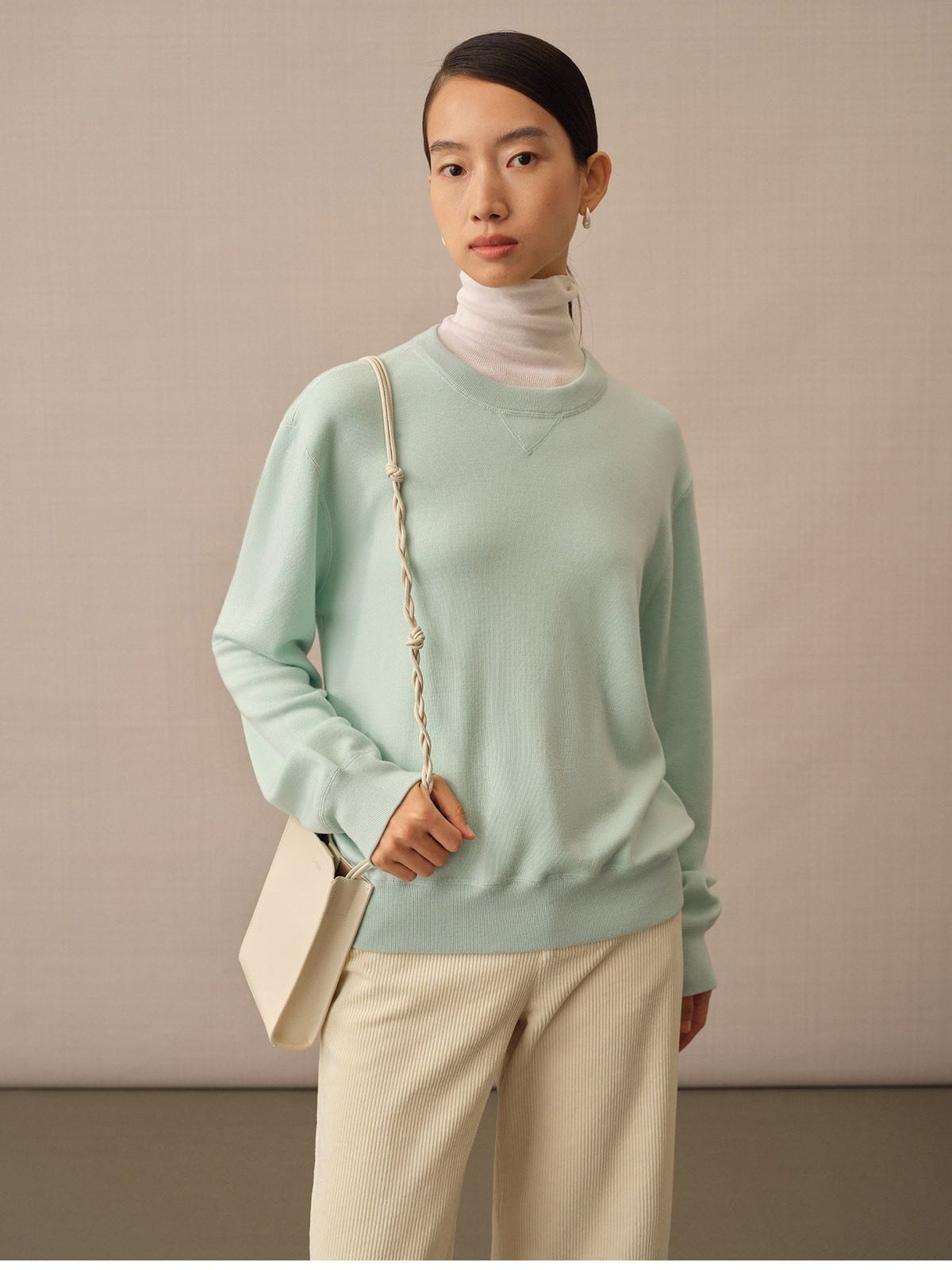TEASEL Merino Wool Crewneck Sweatshirt in Mint - On Female Model