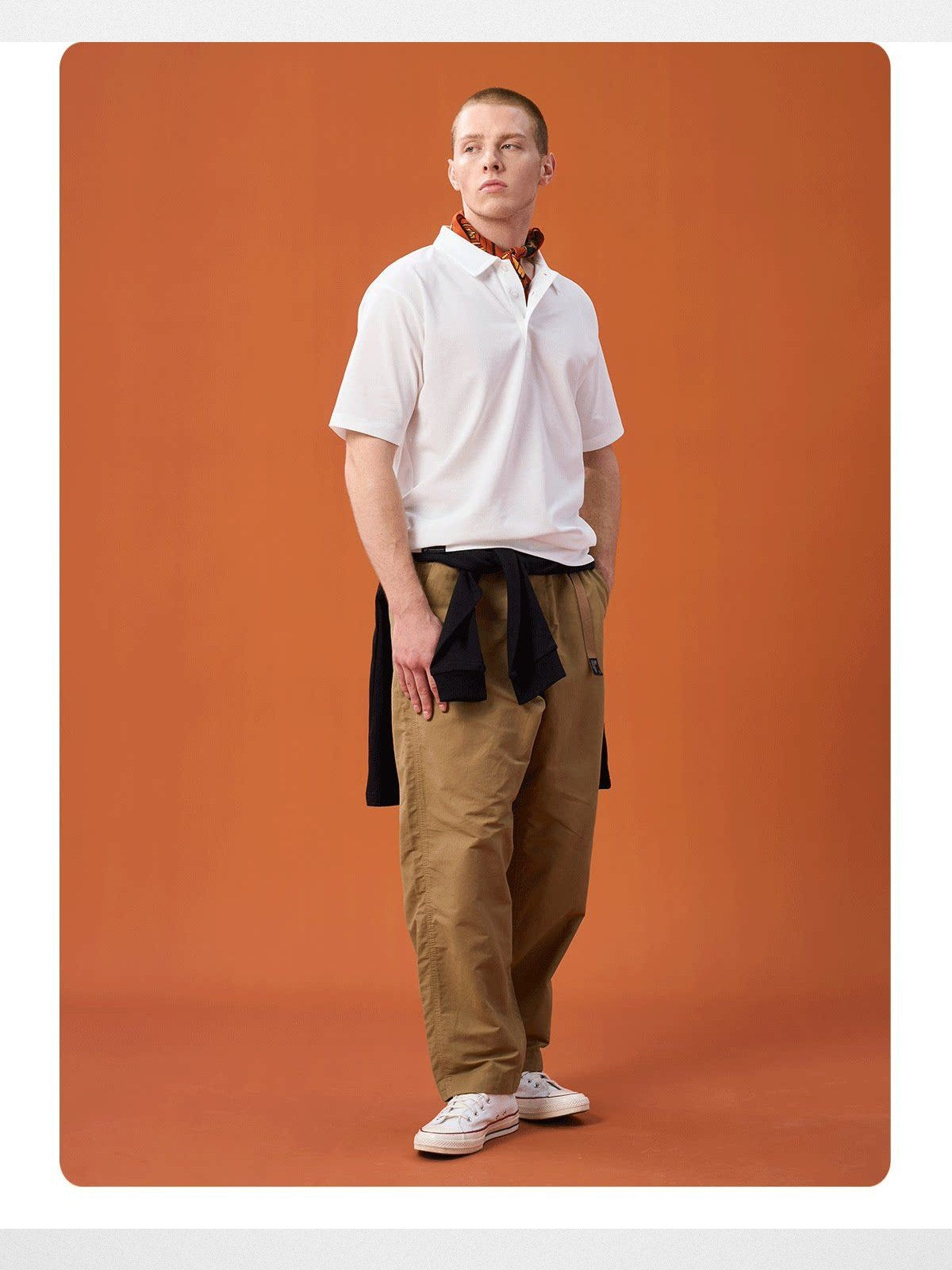 Soda Trendy Belted Cotton Nylon Tapered Pants in Beige - On Male Model