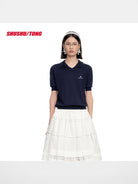 SHUSHUTONG Mulberry Silk Knit Polo Top in Navy Blue - On Female Model