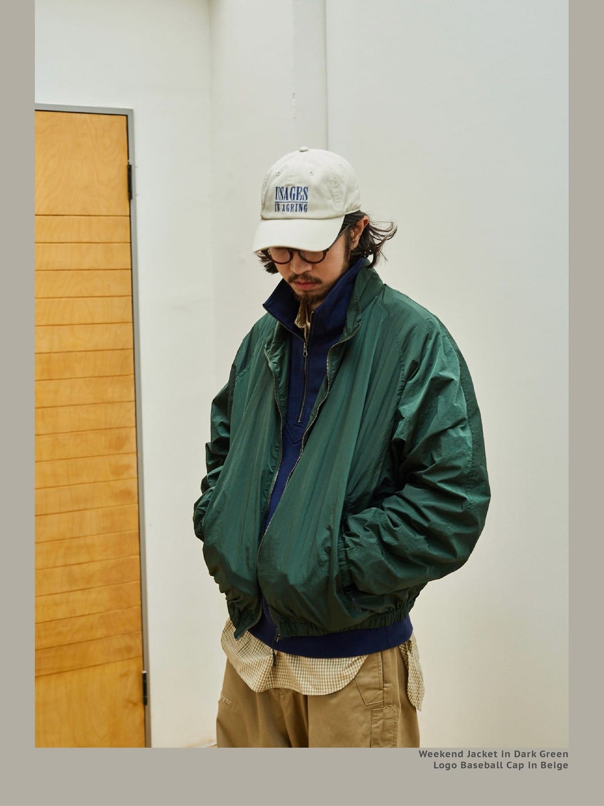 USAGE Lightweight Nylon Zip Up Jacket in Green - On Male Model