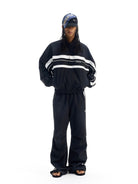 BLINDNOPLAN Color Blocked Zip Up Track Jacket in Black - On Male Model