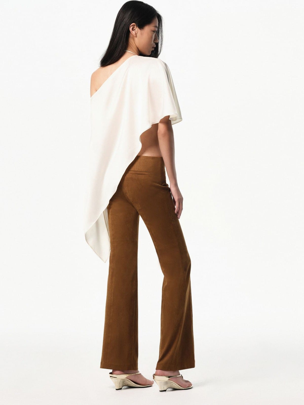 RARELY ALIKE Eco Suede Cropped Bootcut Pants in Caramel - On Female Model