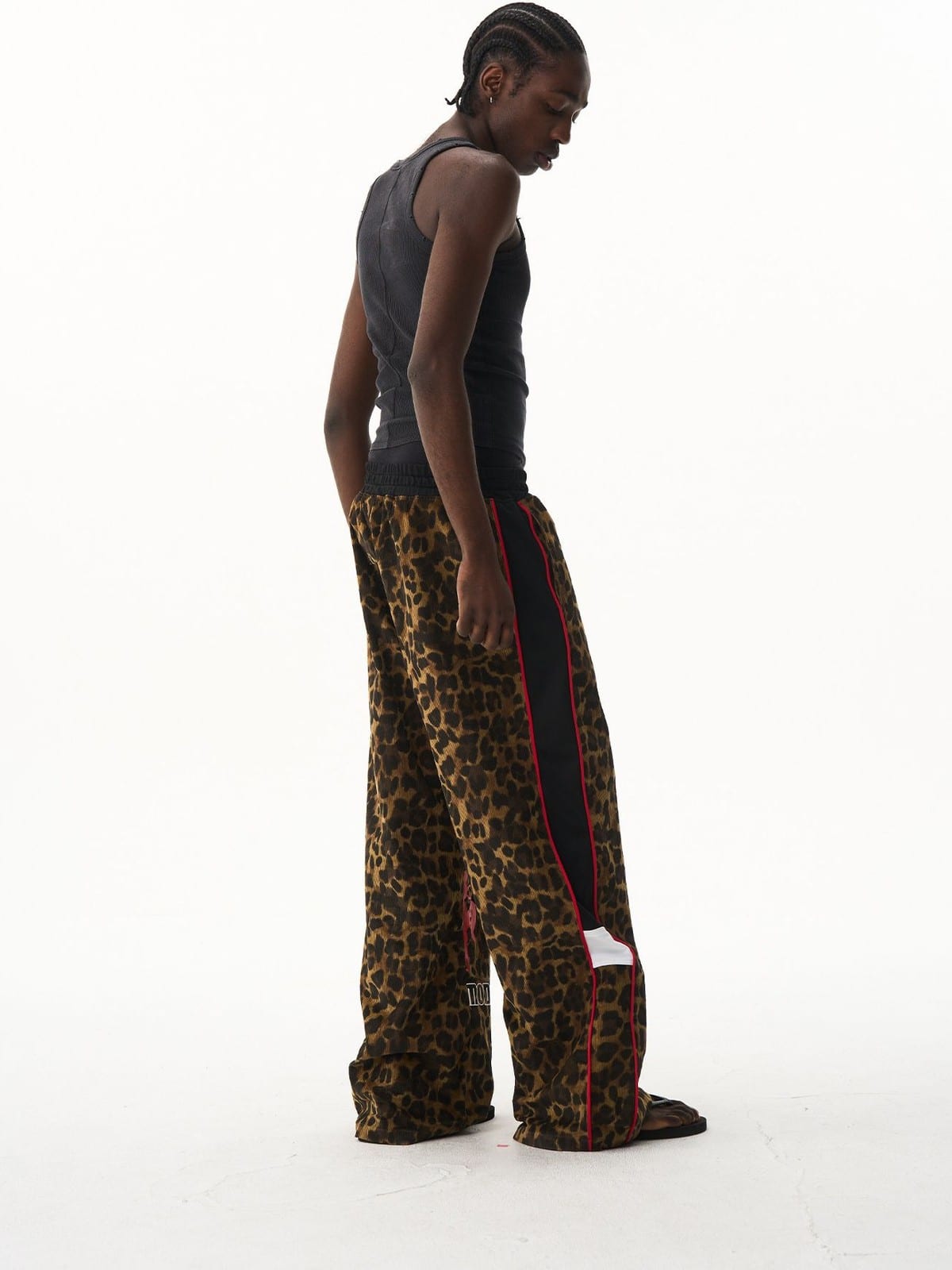 BLINDNOPLAN Leopard Print Graphic Sweatpants in Brown - On Male Model
