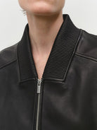 MSBEAST Double Zip Cropped Sheepskin Leather Jacket in Black - On Female Model