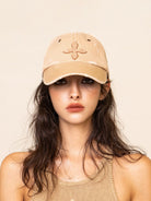 SMFK Distressed Cross Embroidered Baseball Cap in Beige - On Female Model