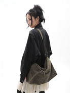 JANDRESS Belted Matte Leather Hobo Bag in Green - On Female Model