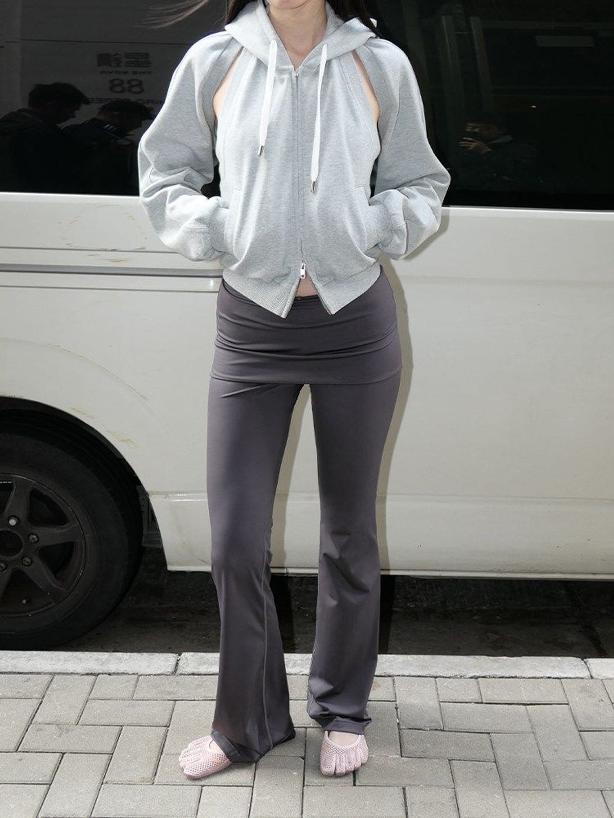 RARELY ALIKE Low Rise Layered Flared Yoga Pants in Gray - On Female Model