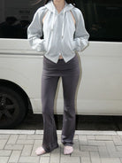 RARELY ALIKE Low Rise Layered Flared Yoga Pants in Gray - On Female Model