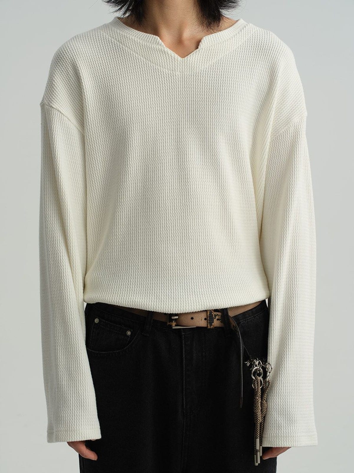 JCAESAR STUDIO Cropped V Neck Jacquard Sweatshirt in White - On Model