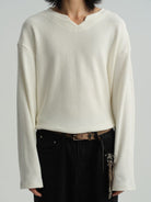 JCAESAR STUDIO Cropped V Neck Jacquard Sweatshirt in White - On Model