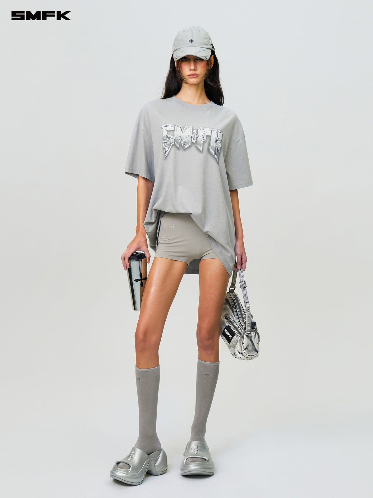 SMFK Metallic Logo Cotton T Shirt in Gray - On Female Model