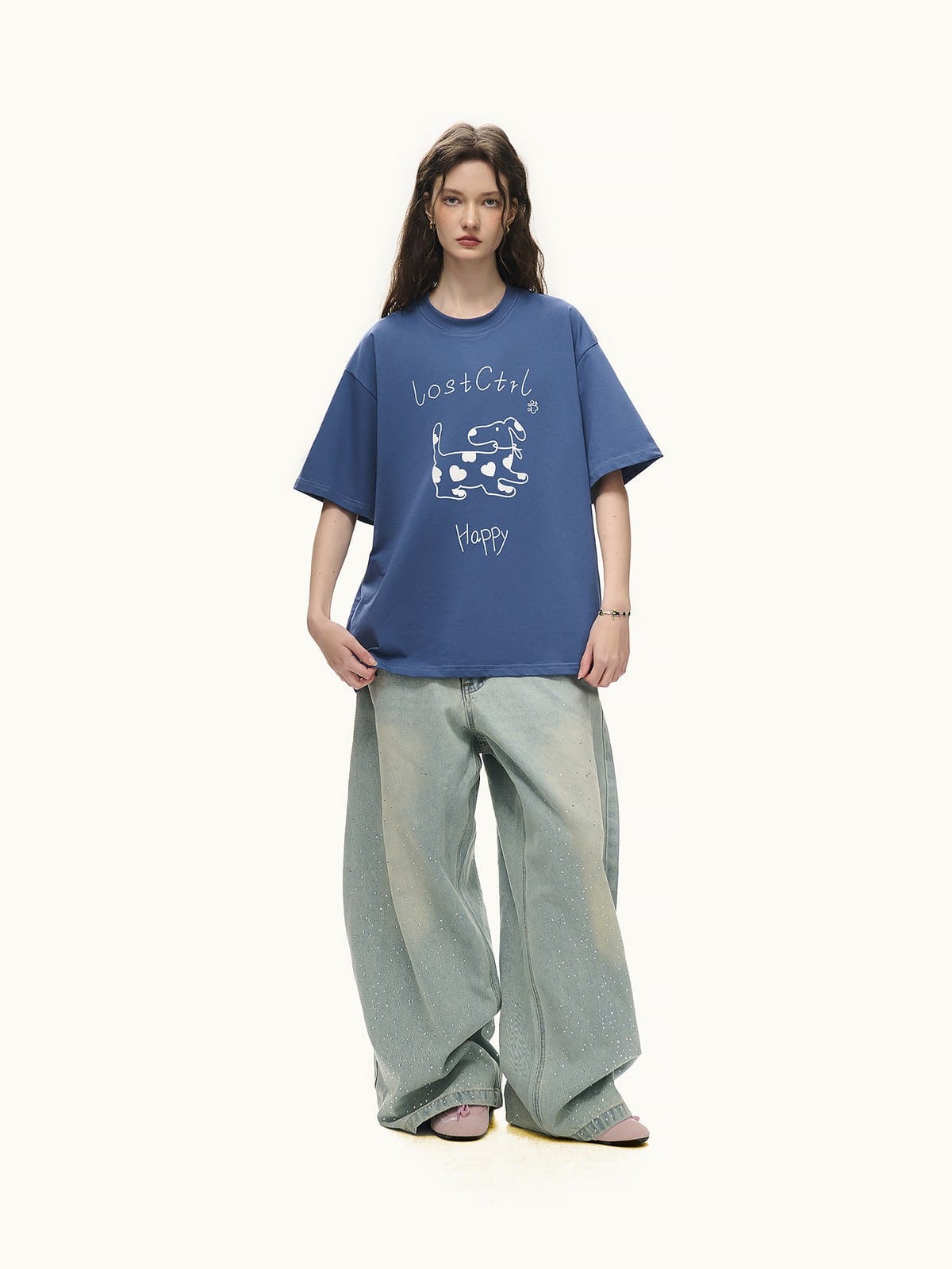 LOSTCTRL Spotted Dog Graphic Crewneck T Shirt in Blue - On Female Model