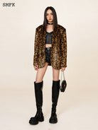SMFK Glossy Waxed Denim Micro Shorts in Black - On Female Model
