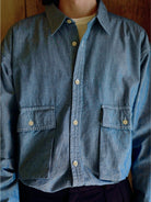 USAGE Cotton Chambray Safari Shirt in Denim - On Male Model