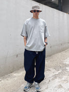 SODA Nylon Tapered Training Pants in Navy Blue - On Male Model