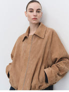 MSBEAST Cropped Leather Drawstring Jacket in Beige - On Female Model