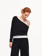 PUKI Mock Layered Halter Sweatshirt in Black - On Female Model