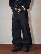 MEDM Contrast Stitch Raw Denim Jeans in Blue - On Model