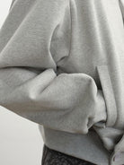 JCAESAR STUDIO Double Button Cross Collar Hoodie in Gray - On Model