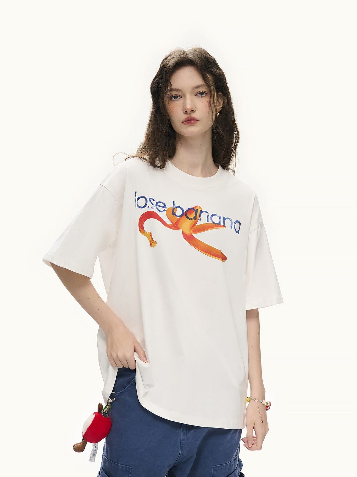 LOSTCTRL Distressed Banana Print Sorona T Shirt in White - On Female Model