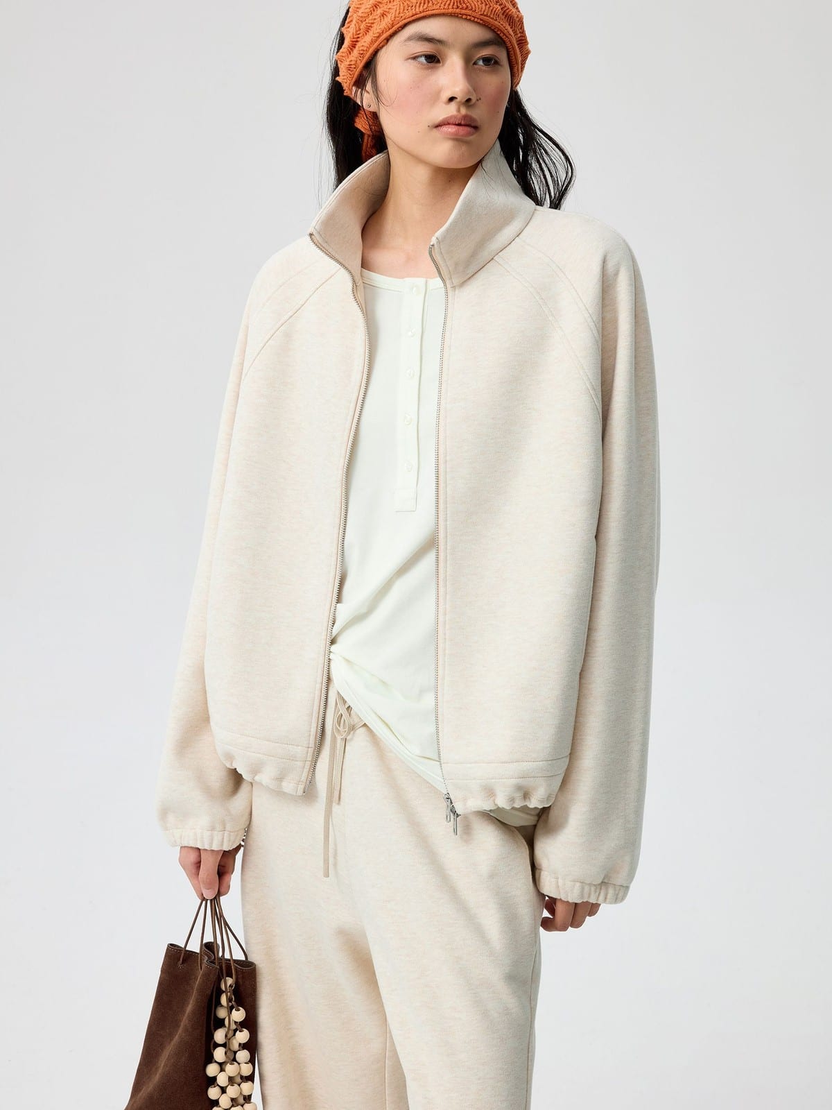 SIMPLE PROJECT Ruffled Adjustable Collar Zip Hoodie in Beige - On Female Model