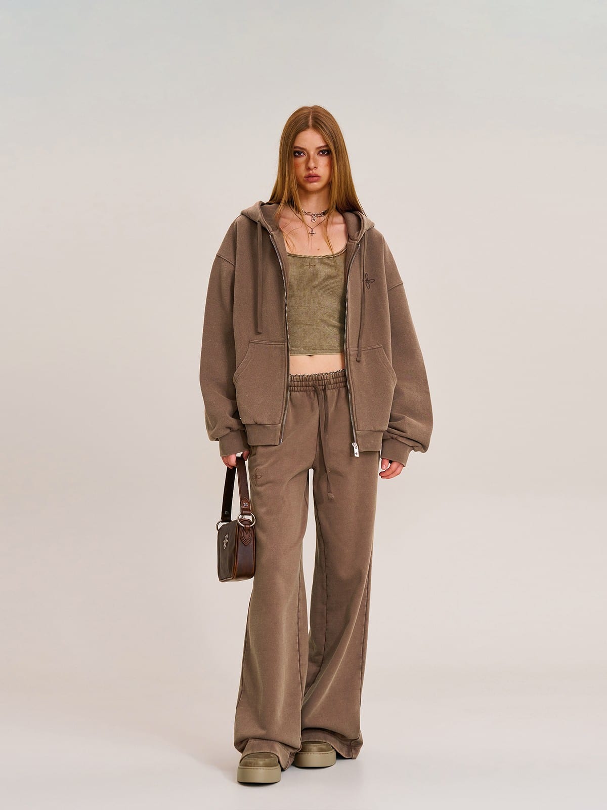SMFK Cross Embroidered Zip Up Hoodie in Brown - On Female Model
